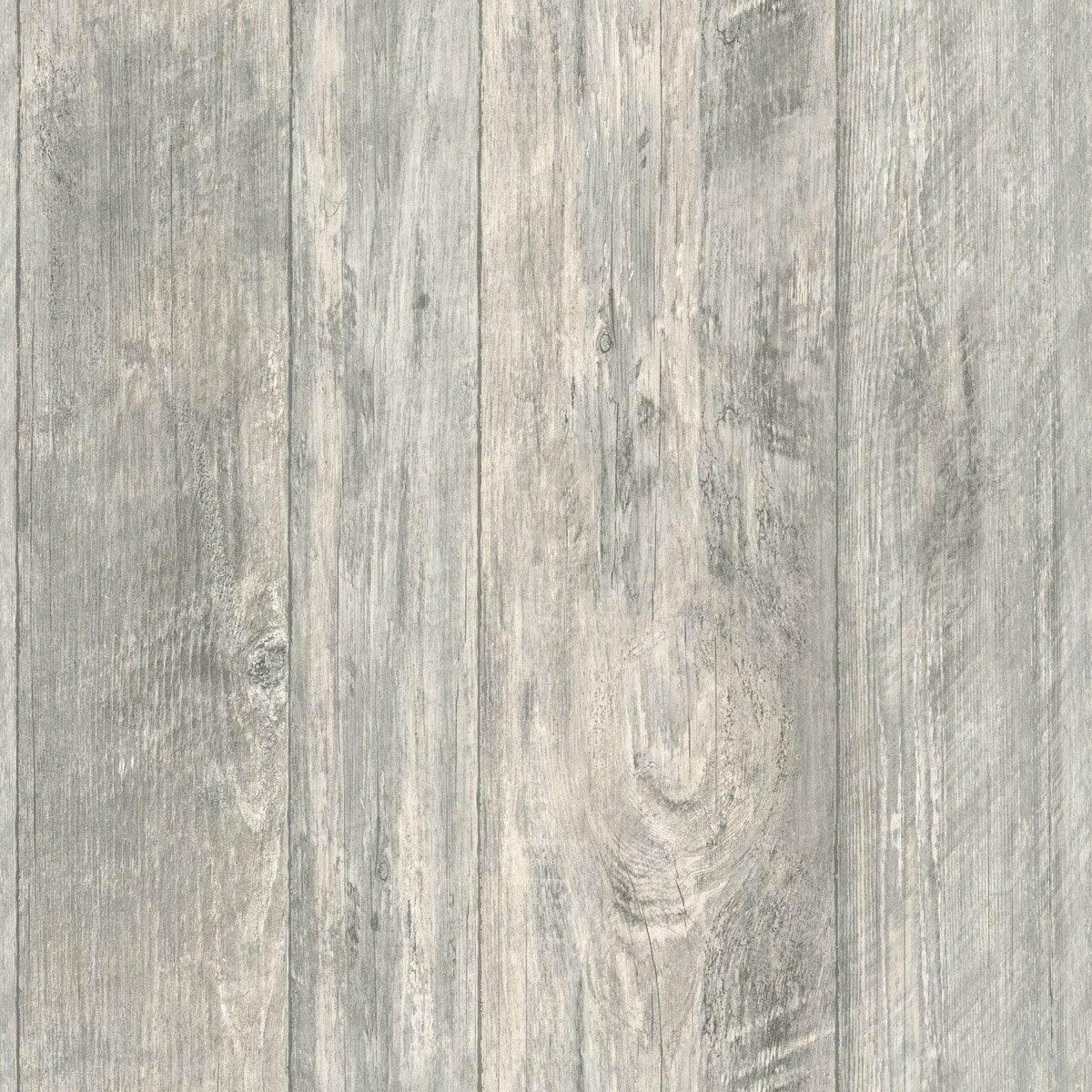 A close-up view of a weathered wooden surface with vertical planks, showcasing rustic charm. The wood has a light gray tone with visible grain patterns, knots, and textures, giving it an authentic appearance. The planks are aligned uniformly like York Wallcoverings' Grey Rustic Wood Wallpaper (56 SqFt).