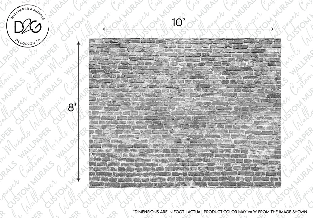 A backdrop of a grey brick wall measuring 10 feet in width and 8 feet in height exudes both modern elegance and industrial charm. Constructed of uniform rectangular bricks with a slightly rustic texture, the wall features a subtle watermark indicating it is a Washed Grey Brick Wall Wallpaper Mural from Decor2Go Wallpaper Mural.