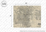 A vintage-style Decor2Go Wallpaper Mural showing detailed street layouts and geographic features such as rivers, marked in earthy tones. Text annotations and coordinates are visible.