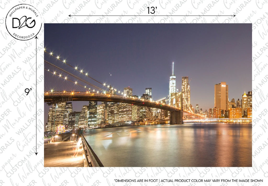 A panoramic view of a brightly lit Brooklyn Bridge at night with the Manhattan skyline, including the Freedom Tower, illuminated in the background can be seen in the "Manhattan's Night Sky Wallpaper Mural" by Decor2Go Wallpaper Mural.