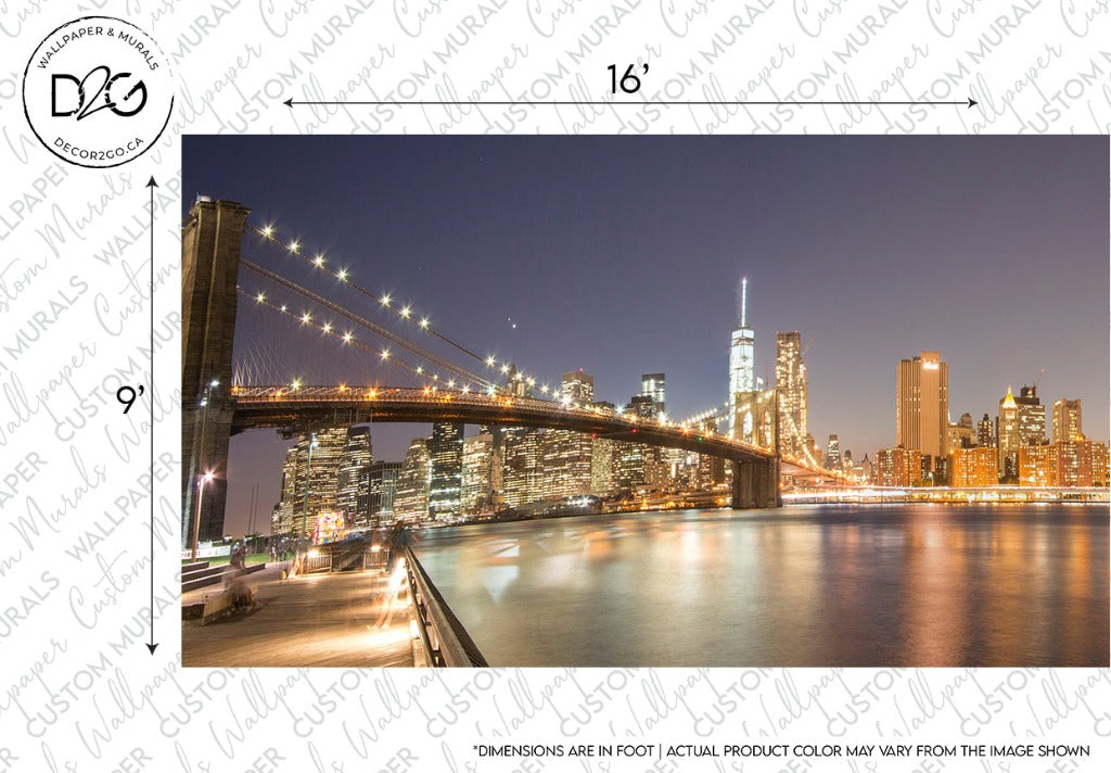 Night view of the Brooklyn Bridge with the illuminated city skyline wallpaper of lower Manhattan in the background, including the One World Trade Center, reflecting off the East River can be beautifully captured with Decor2Go Wallpaper Mural's Manhattan's Night Sky Wallpaper Mural.