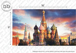 A vibrant, colorful depiction of Saint Basil's Cathedral in Moscow, Russia, with its iconic onion-shaped domes at sunset. The sky is painted with hues of orange, pink, and blue. This St. Basil’s Cathedral Wallpaper Mural by Decor2Go Wallpaper Mural measures 16 feet wide and 9 feet tall.