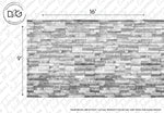 Sentence with specified product and brand name: Black and white image of a Decor2Go Wallpaper Mural Grey Stone Wall Wallpaper Mural displaying an array of uneven embossed brick bricks, with dimensions labeled as 16 inches by 9 inches for scale.