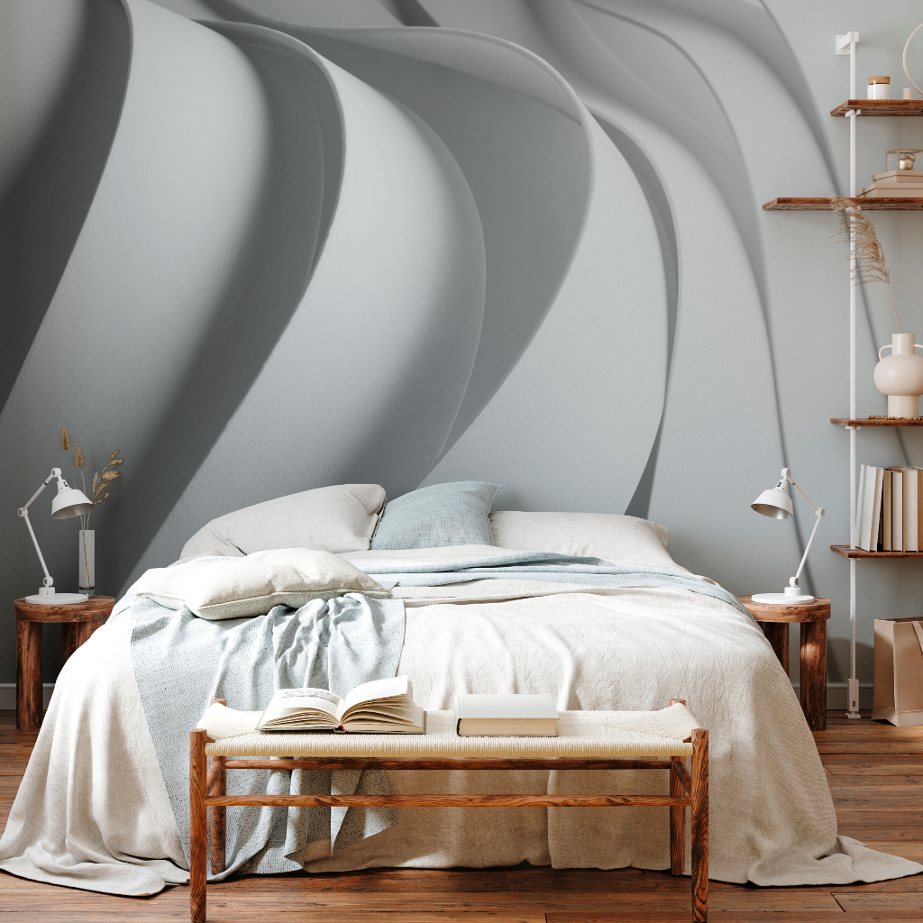 Bedroom with 3D waves mural in the background  