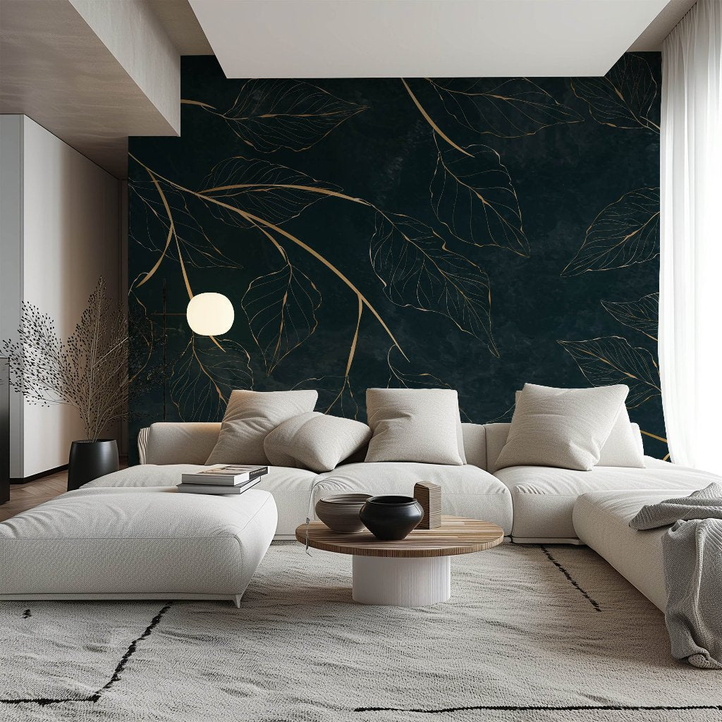 A modern living room showcases a white sectional sofa and a round wooden coffee table. The dark green accent wall is adorned with the premium quality Golden Leaves Wallpaper Mural by Decor2Go Wallpaper Mural. A floor lamp with a round shade stands beside the sofa, all situated on a textured white rug.