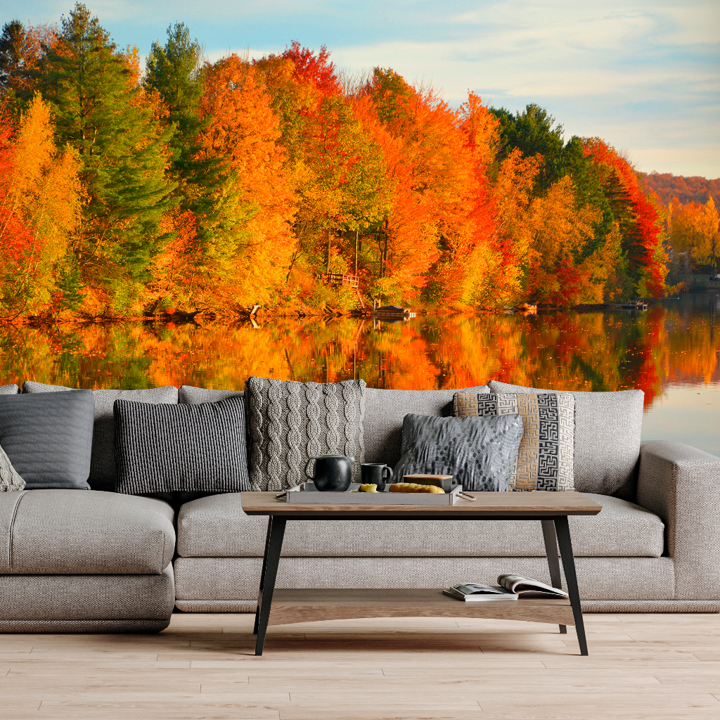 A couch with a table and Fall Foliage Symphony Wallpaper Mural by Decor2Go Wallpaper Mural in the background.