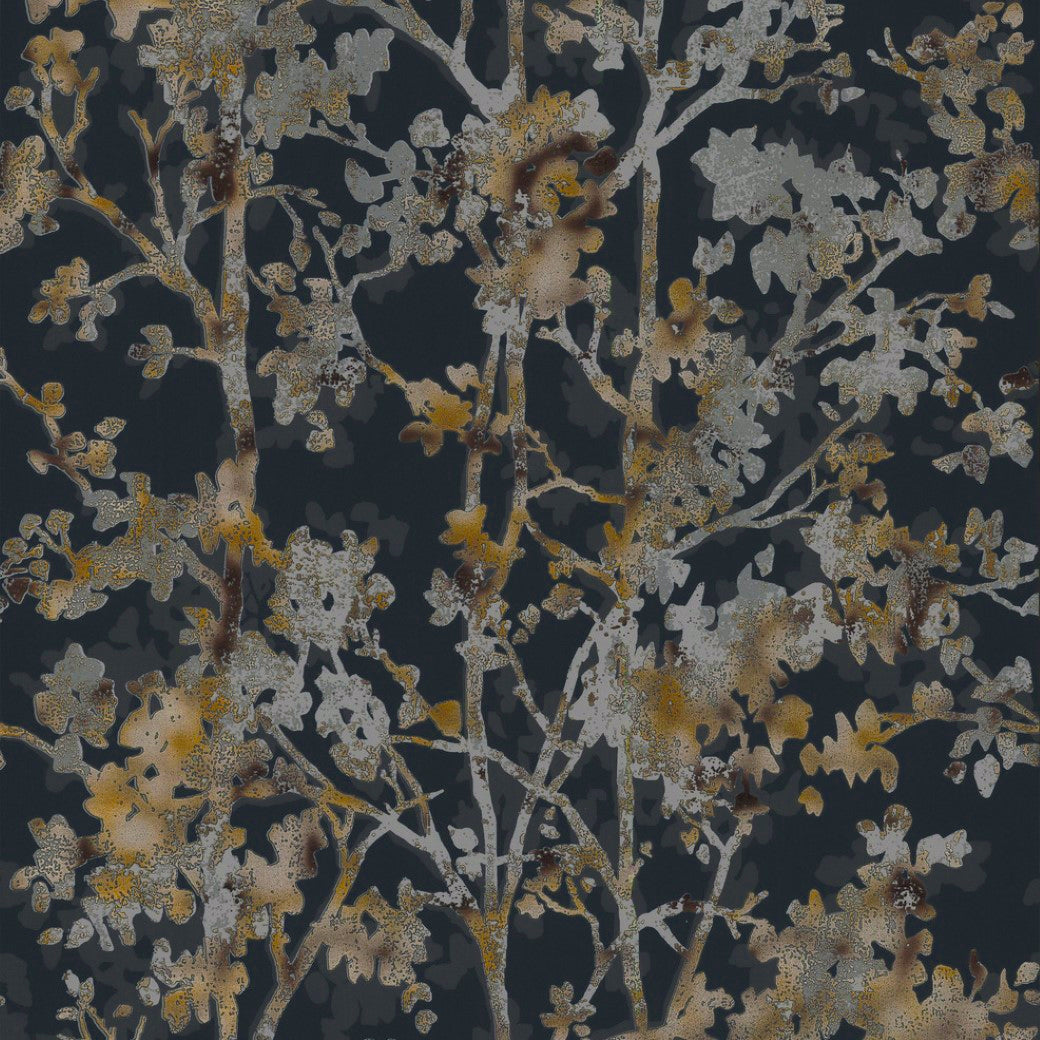 A close-up of York Wallcoverings' Black & Multi Shimmering Foliage Wallpaper, showcasing intricate floral patterns in muted gray, brown, and ochre on a dark background for a vintage textured look.