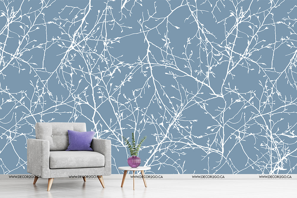 Living Room - Modern minimalist living room with a grey armchair, a purple pillow, and a small plant in a pink pot. The room features an elegant Decor2Go Wallpaper Mural for a stylish atmosphere.