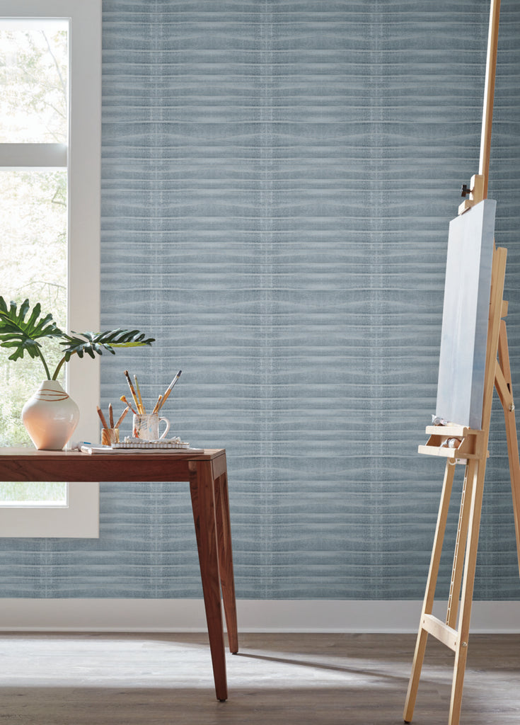 Boho design furniture with striped printed stone wallpaper