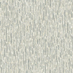 The Cream & Silver Metallic Cascade Wallpaper by York Wallcoverings displays textured vertical streaks in light gray and off-white for an abstract, rain-like effect. Its metallic sheen enhances modern high-impact spaces with elegance and sophistication, covering 60 SqFt.