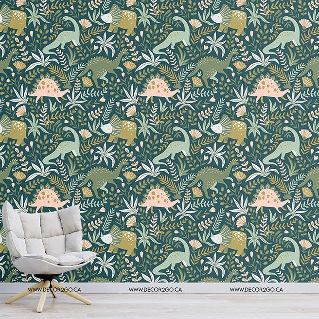 Living Room - A modern living room corner with a stylish white armchair and a small table with books, against a vibrant Decor2Go Wallpaper Mural adorned with a pattern of tropical leaves and Dinosaur Wilderness Wallpaper Mural.