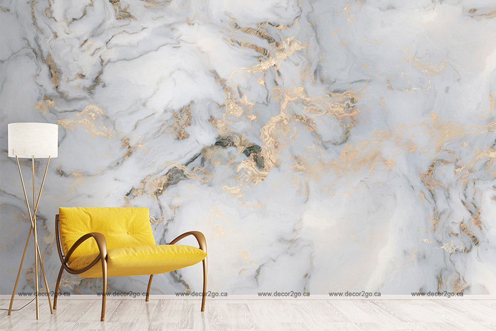 An elegant interior featuring a Decor2Go Wallpaper Mural dreamscape wallpaper in white and gray with gold veins, and a contemporary yellow chair with a minimalistic white lamp on the left.