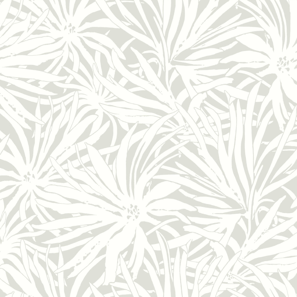 The Floral Canopy Grey Wallpaper by York Wallcoverings features white tropical leaves and flowers in a seamless botanical pattern on a light gray background, adding subtle elegance to any space. Covers 60 SqFt.