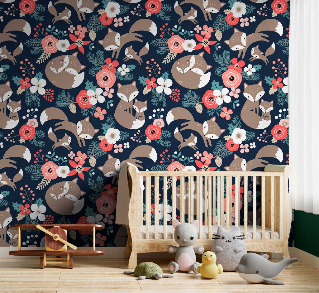 A cozy nursery room featuring a Decor2Go Wallpaper Mural with a whimsical Foxes and Flowers pattern, a wooden crib, a rocking horse, and plush toys on a hardwood floor.