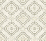 An intricate, repeating pattern featuring cream, taupe, and light gray floral and geometric shapes on a light beige background. The design includes symmetrical, ornate motifs with a vintage, classic style. This botanical elegance offers the perfect touch to your space with Garden Trellis Onyx Wallpaper Black, Grey (60 Sq.Ft.) from York Wallcoverings.