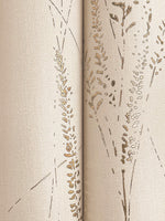 Close-up of Graceful Willow Pale Straw Wallpaper by York Wallcoverings, featuring a textured beige surface with a brown and gold wheat-inspired pattern positioned along a vertical seam.