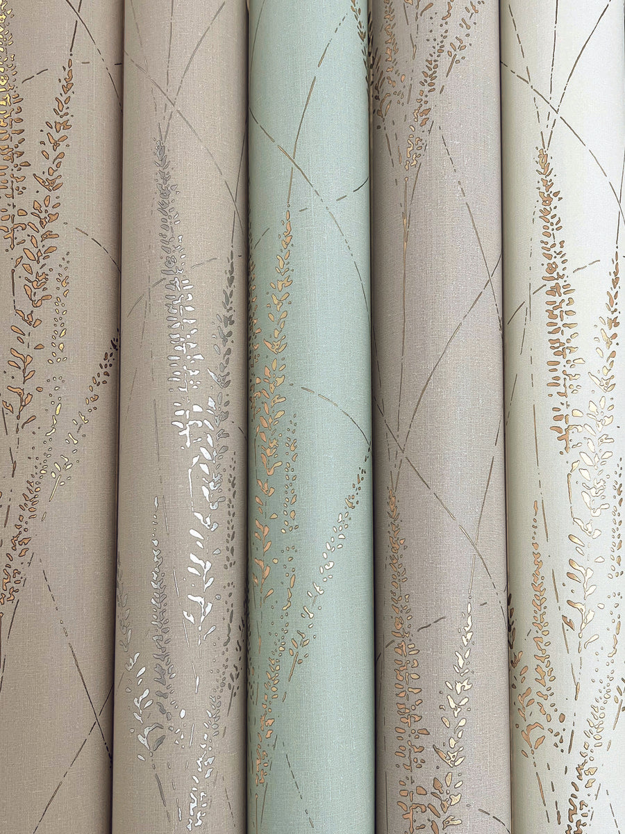 Four rolls of York Wallcoverings’ Graceful Willow Stone Wallpaper (60 SqFt each), featuring vertically arranged delicate leaf and branch patterns in muted beige, sage, and metallic gold.