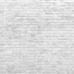 A textured background depicting a wide feature wall of Great White Wall Wallpaper Mural from Decor2Go Wallpaper Mural with visible details and variations in the brick sizes and arrangement.