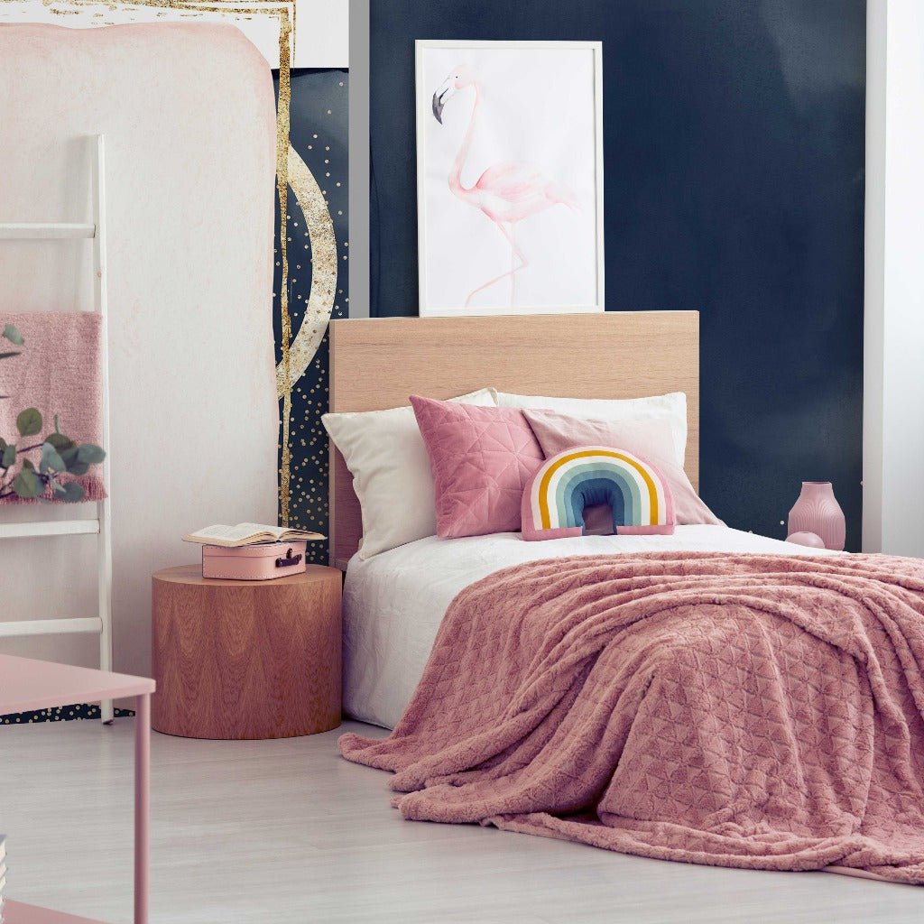 A stylish bedroom featuring a pastel pink theme with a cozy bed, blush accents, a flamingo feature wall, and a subtle mix of modern and vintage Decor2Go Wallpaper Mural items.