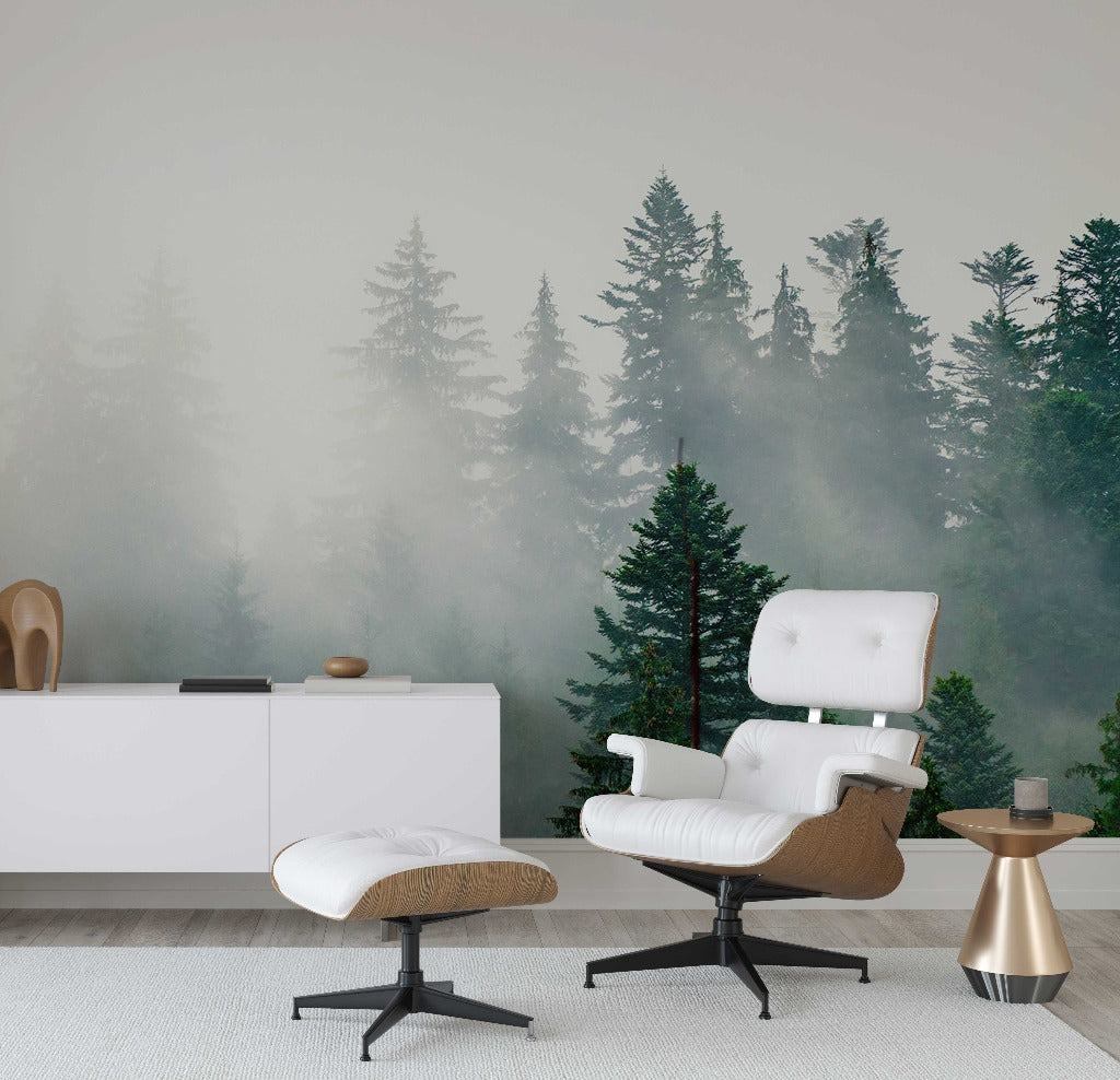 A modern living room with a white lounge chair and ottoman, set against a wall featuring a Decor2Go Wallpaper Mural. A sleek white cabinet and a metallic side table are also present.
