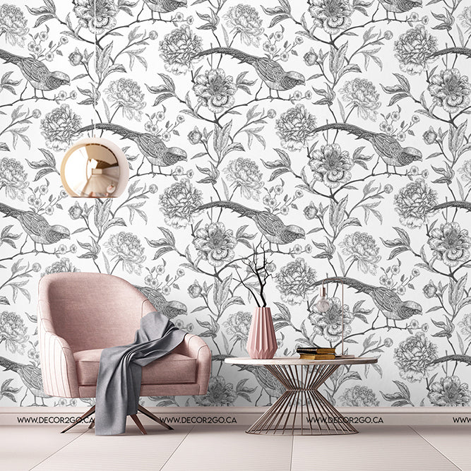 pink chair and table black and white wallpaper with birds and flowers
