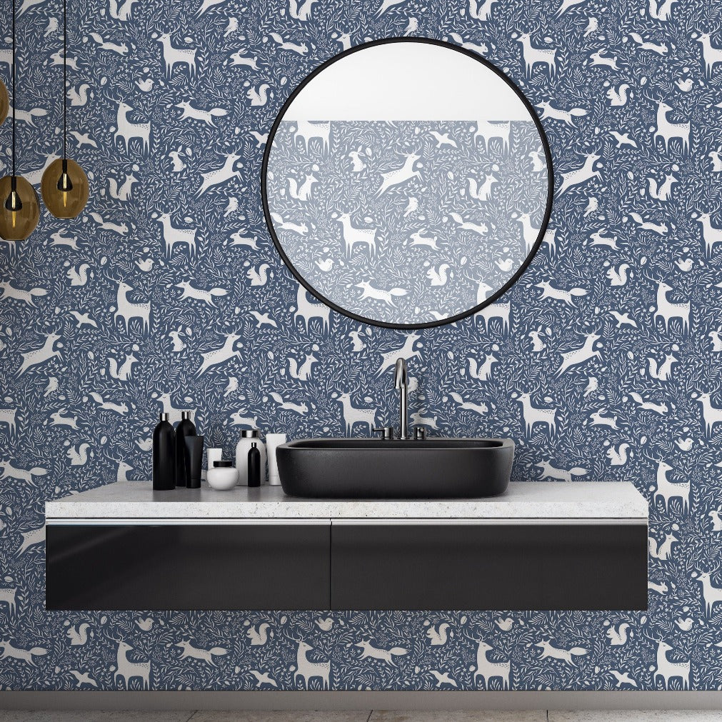 Kids washroom with blue seamless wallpaper 