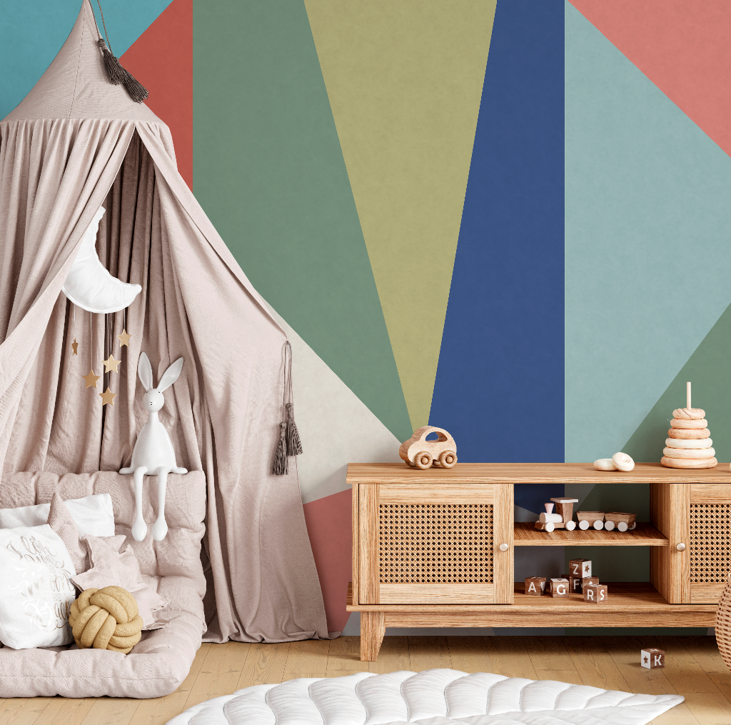 A cozy children's bedroom with a whimsical tent, wooden furniture, a Decor2Go Wallpaper Mural, toys, books, and a small bed with a knitted blanket.