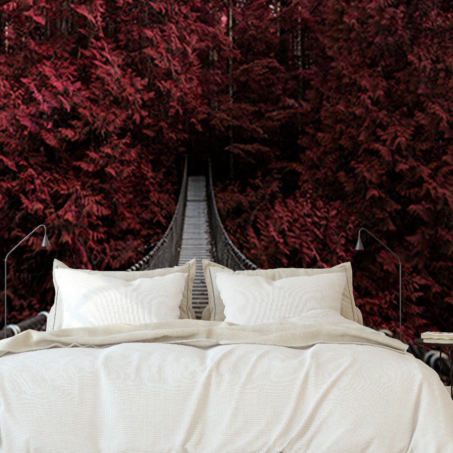 Bedroom - A bedroom with a large Decor2Go Wallpaper Mural depicting a path surrounded by vibrant crimson foliage. The room features a double bed with white bedding in the foreground.