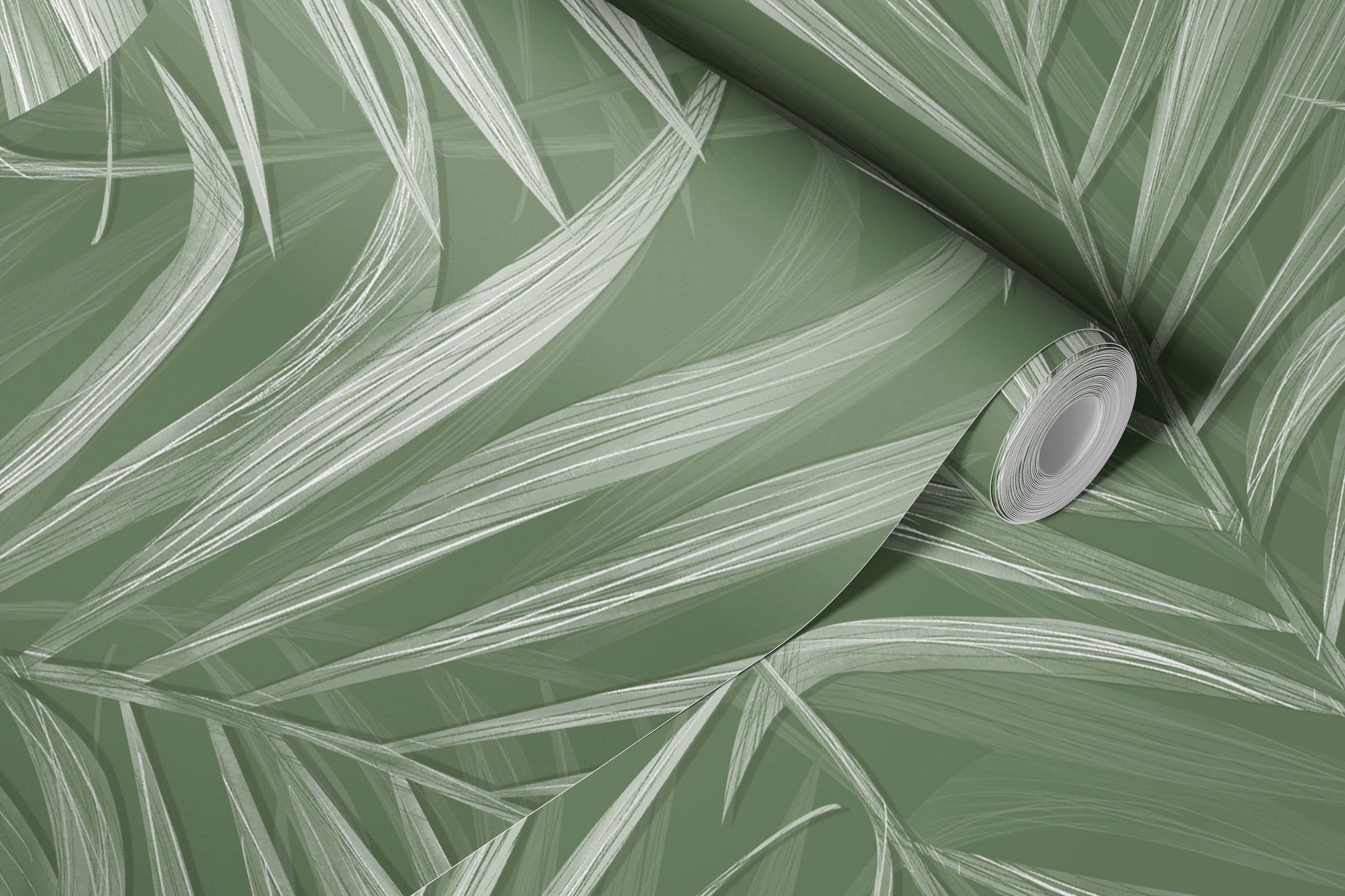 Roll of green wallpaper with white leaf pattern
