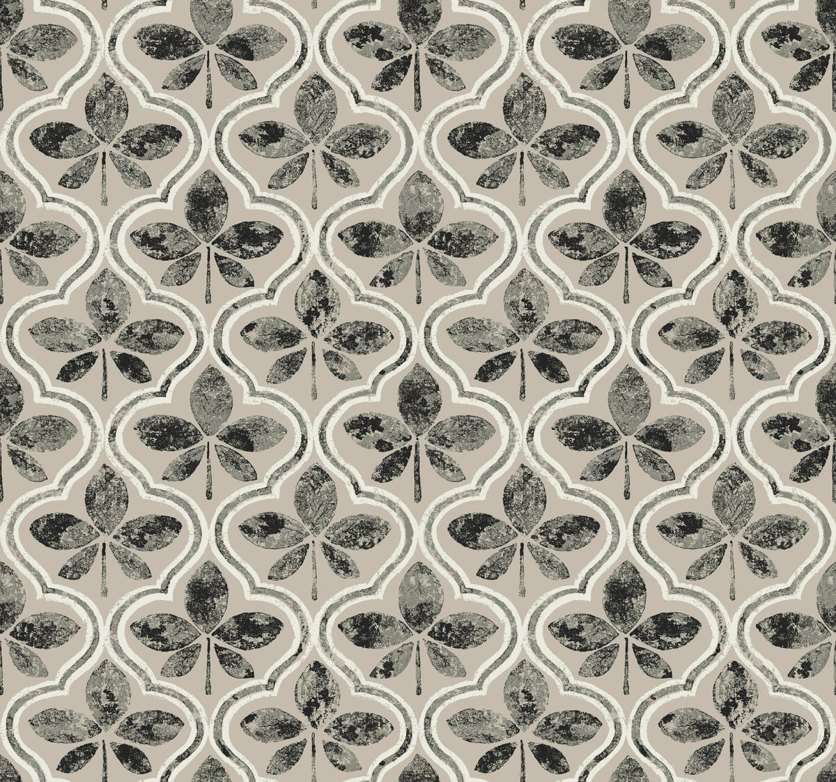 A repeating pattern featuring dark green and beige clover shapes arranged in a lattice framework. Each clover appears within a beige, fleur-de-lis-like outline on a light textured background, creating a vintage, ornate design that embodies Geometric Elegance perfect for Sevilla Onyx Wallpaper Black, Brown (60 Sq.Ft.) by York Wallcoverings.