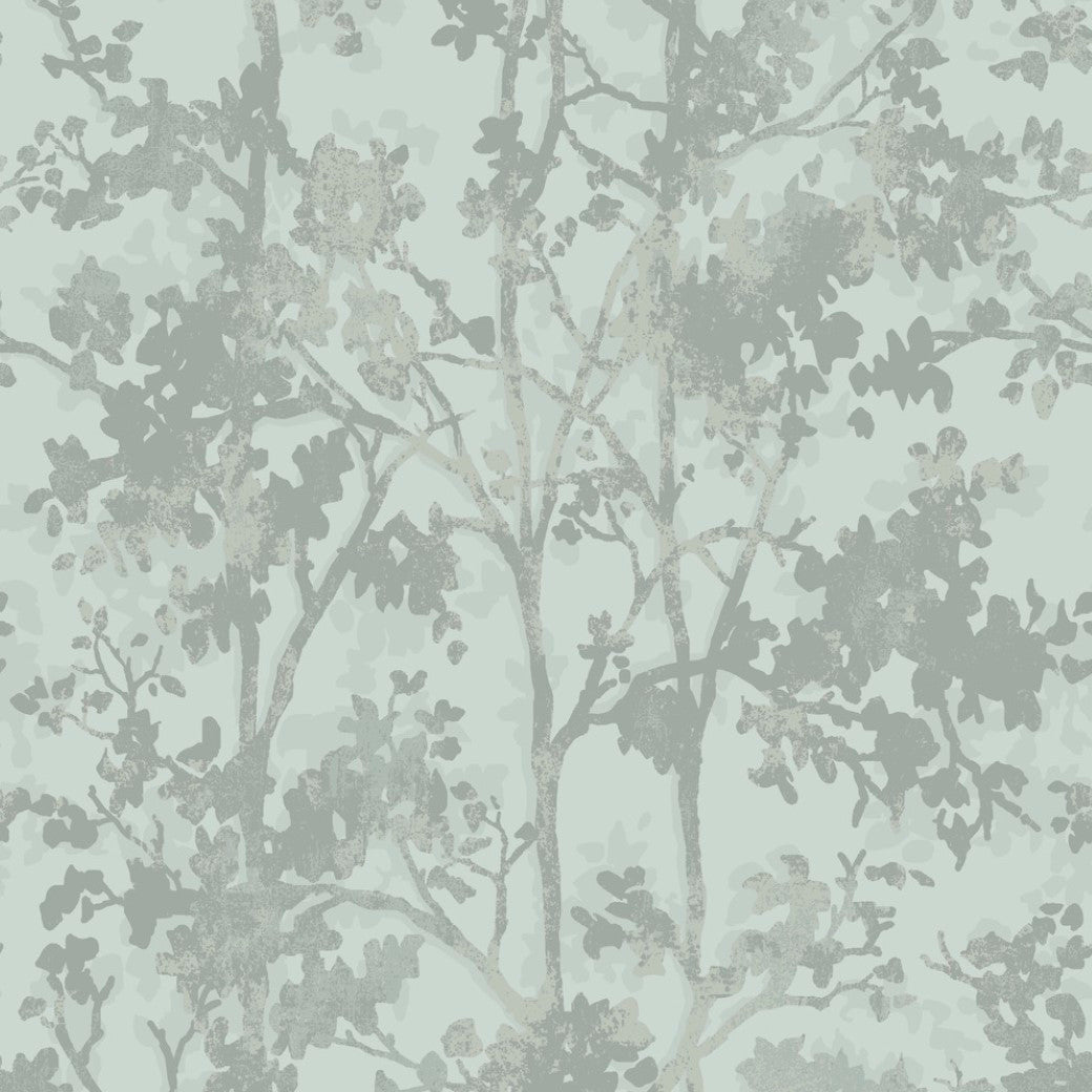 York Wallcoverings' Spa & Silver Shimmering Foliage Wallpaper features gray tree branch and leaf silhouettes layered on a light mint green background with pewter metallic accents, evoking a subtle forest scene in an abstract modern style.