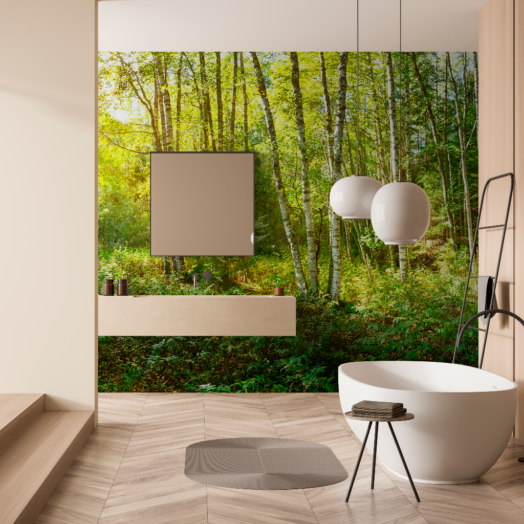 A modern bathroom featuring a freestanding bathtub and large window with a view of a lush forest. The room has wooden floors, a white ladder, minimalistic decor, and an Decor2Go Wallpaper Mural feature.