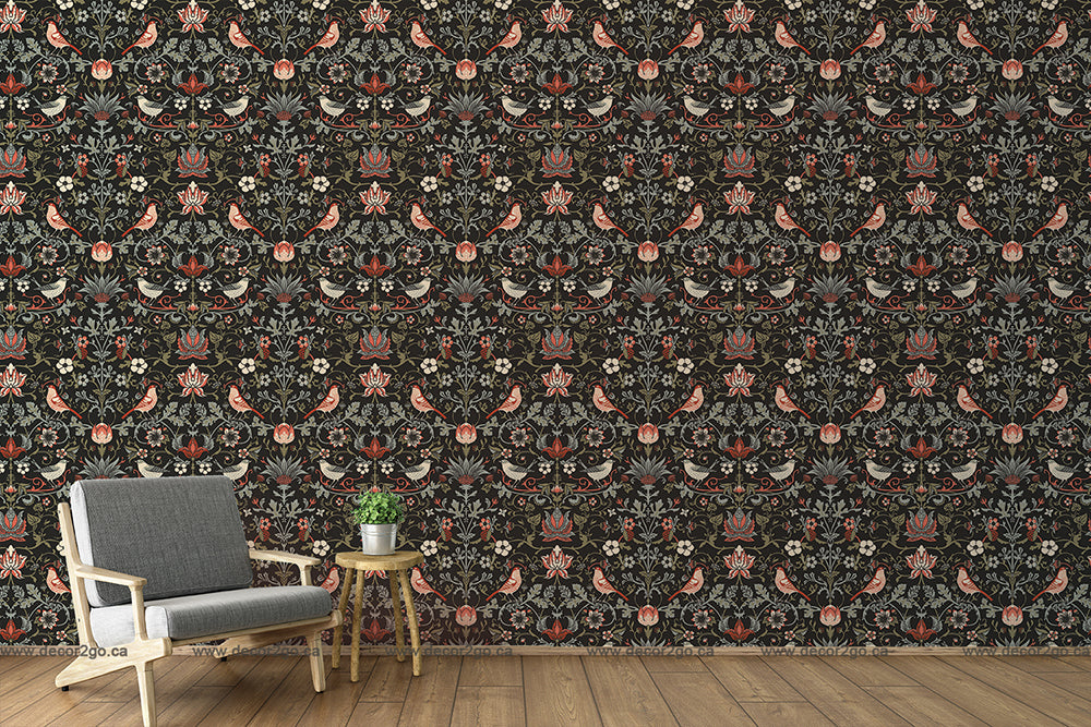 A stylish room with a bold, Decor2Go Wallpaper Mural featuring the Victorian Times pattern in dark tones with bright pink accents. A modern gray armchair and a small green side table are placed against the wall.