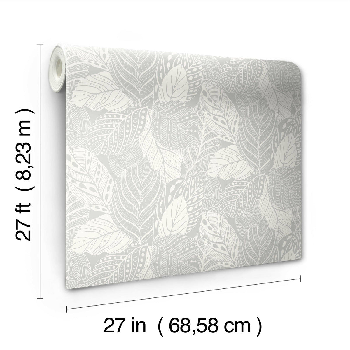 A roll of York Wallcoverings Vinca Glint Wallpaper Metallic (60 Sq.Ft.) features a leaf pattern design in various shades of gray and white. The wallpaper dimensions are width 27 inches (68.58 cm) and length 27 feet (8.23 meters). Made of durable non-woven material, the roll appears partly unrolled against a white background.