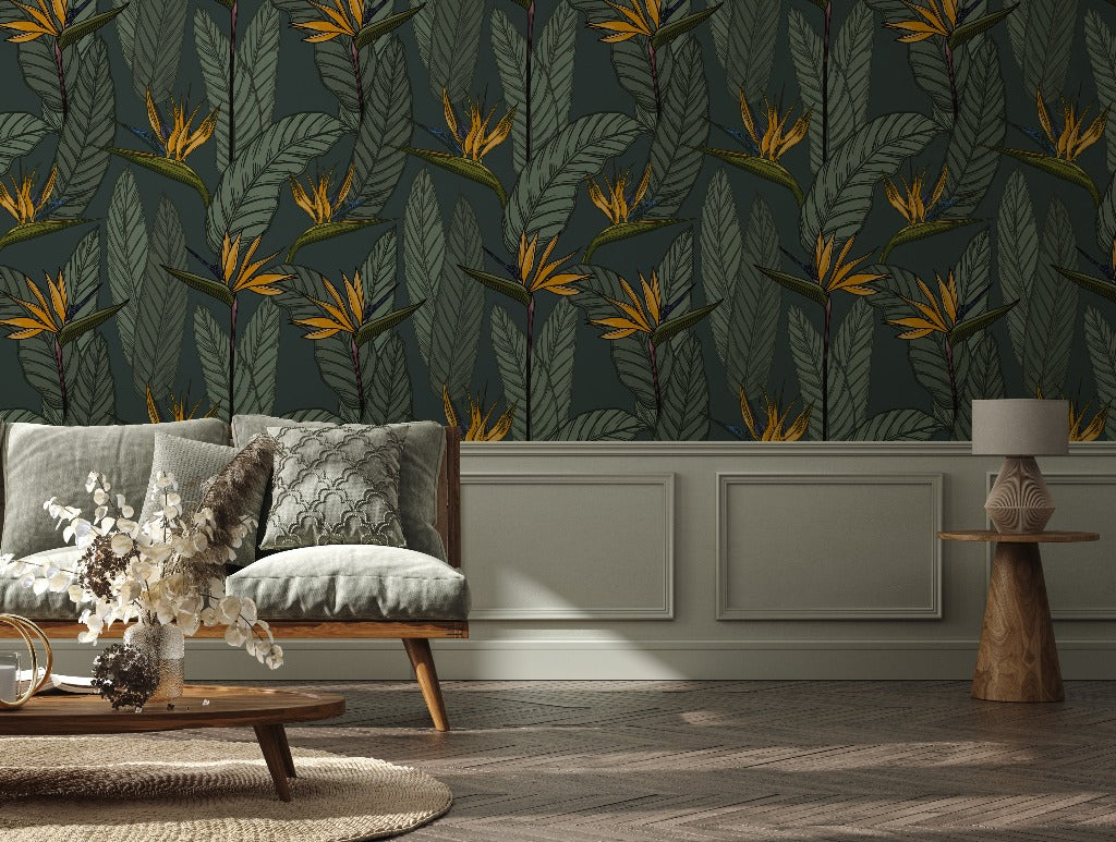 A stylish living room featuring a gray tufted sofa against a wall with bold, Decor2Go Wallpaper Mural. A wooden coffee table with a glass vase and round side table complement the modern decor.
