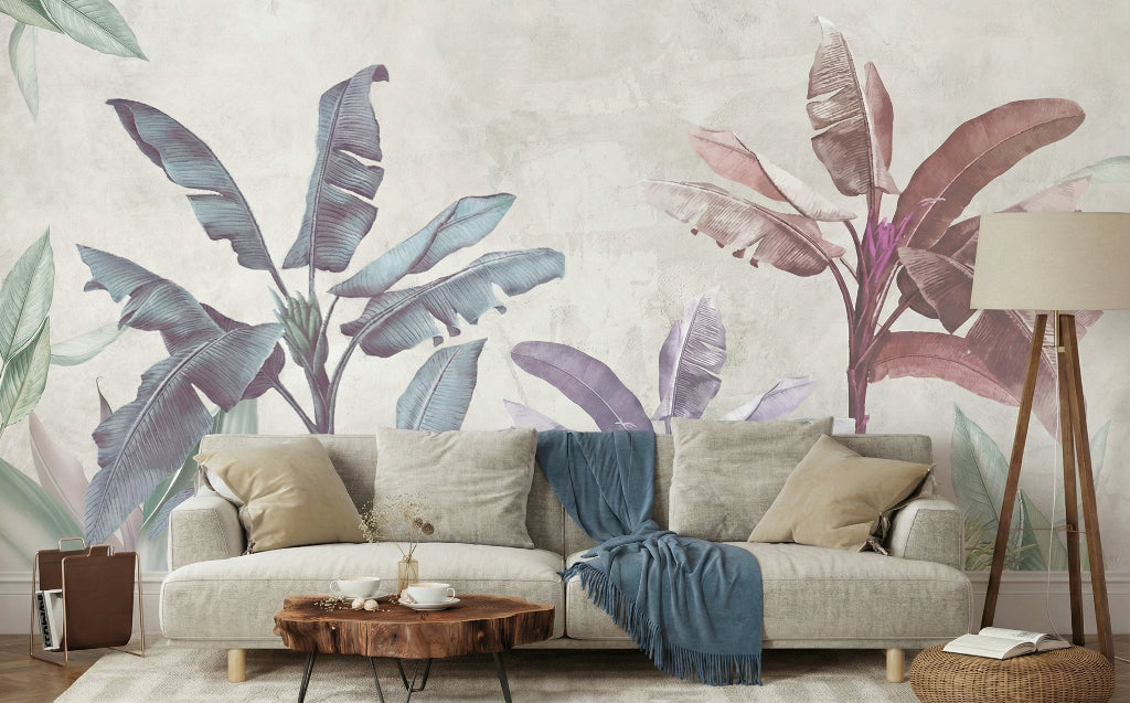 Living Room - Living room with a sofa against a wall featuring large leaf patterns.