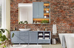 A stylish bathroom with a blue vanity cabinet, vessel sink, Decor2Go Wallpaper Mural, and a mirrored cabinet, complemented by houseplants and natural light.