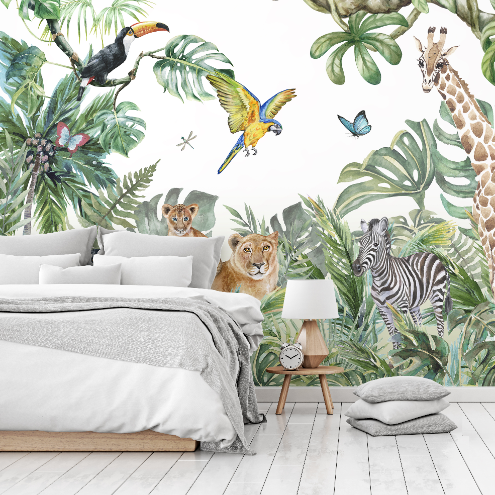 A vibrant bedroom with a Wild Animals and the Jungle Watercolor mural featuring a giraffe, zebra, lion, and exotic birds. A neatly made bed with white bedding complements the lively decor from Decor2Go Wallpaper Mural.