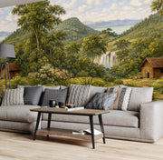 Living room - green valley landscape wall mural with waterfall, hills, and cabin