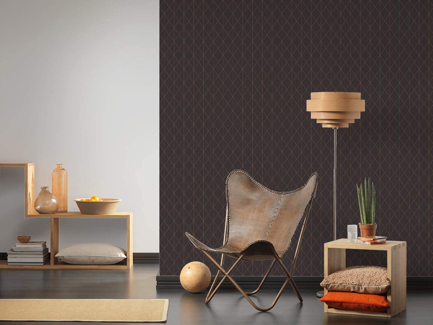 Living Room - A modern minimalist features a brown leather butterfly chair, a wooden floor lamp with a beige shade, and Ontario Diamond Geometric Wallpaper (56 SqFt). There are wooden shelves with neutral-colored decor items, including cushions, pottery, and a cactus plant