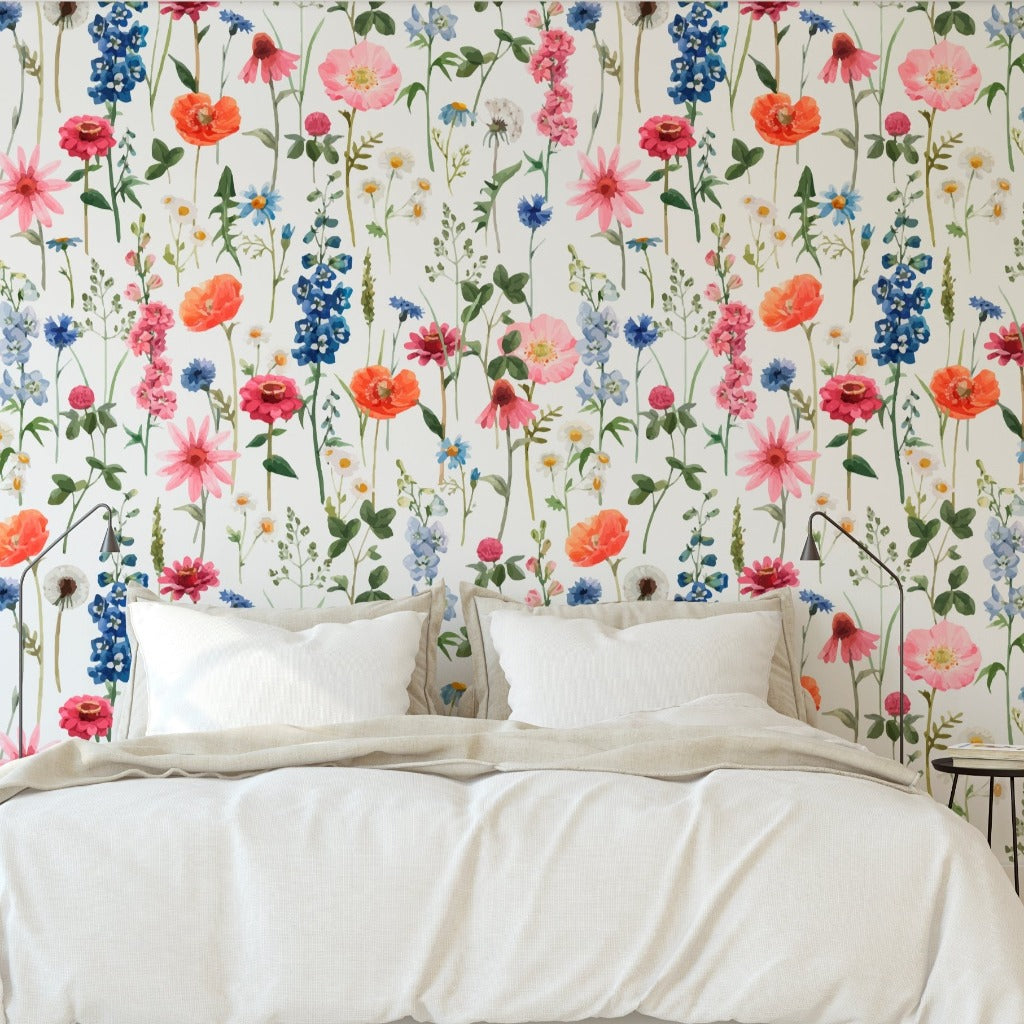 A bed with a cozy vibe and "Floral Summer Wallpaper Mural" by Decor2Go Wallpaper Mural.