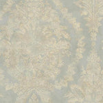 A York Wallcoverings Classic Charleston Damask Wallpaper in Blue (60 SqFt) with an intricate, vintage-style floral damask pattern in muted beige and gold tones on a light blue-gray background. The design features large ornamental flowers and leaves with delicate detailing, creating an elegant and classic aesthetic with pearlescent floral motifs.