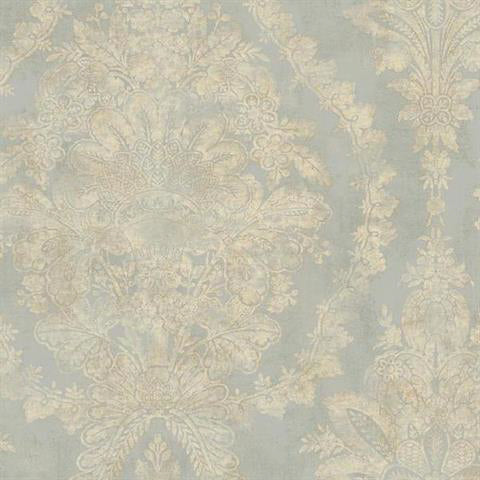 A York Wallcoverings Classic Charleston Damask Wallpaper in Blue (60 SqFt) with an intricate, vintage-style floral damask pattern in muted beige and gold tones on a light blue-gray background. The design features large ornamental flowers and leaves with delicate detailing, creating an elegant and classic aesthetic with pearlescent floral motifs.