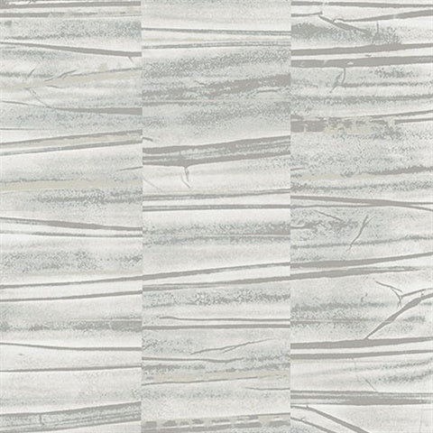 A chic, minimalist wallpaper featuring a pattern of horizontal, jagged lines in various shades of gray. The design mimics natural textures and has a striped appearance, creating an abstract slate and grey wallpaper with a modern look. The Lithos Geometric Marble Wallpaper (56 SqFt) by York Wallcoverings embodies this aesthetic perfectly.